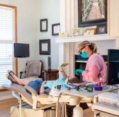 Dental professional treating a patient