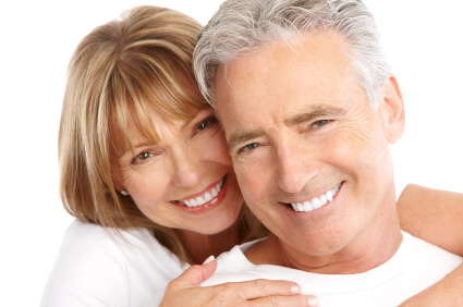 couple smiling with arms holding her husband