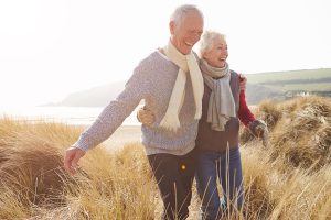 couple taking a stroll on a field