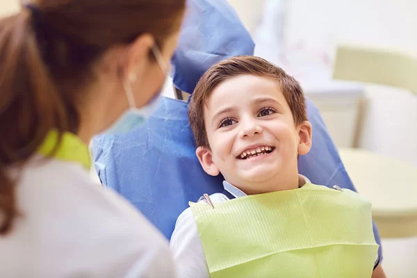 a kid on the dental chair